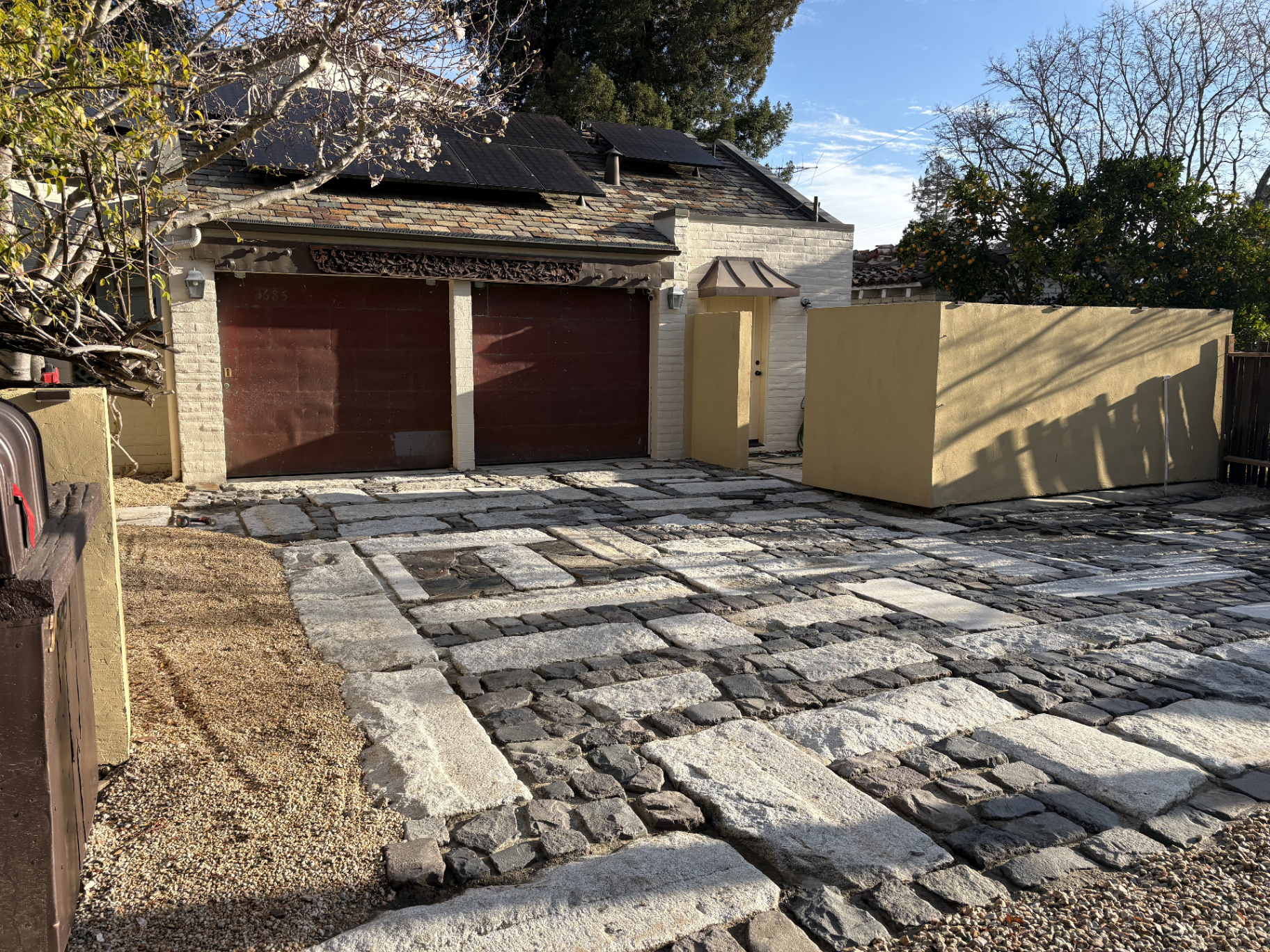 Flagstone Walkway & Landscape Lighting by Skygrid Hardscaping